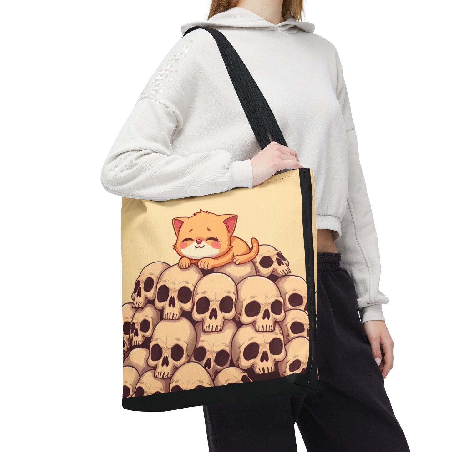 Cute Cat on a Pile of Skulls Tote Bag