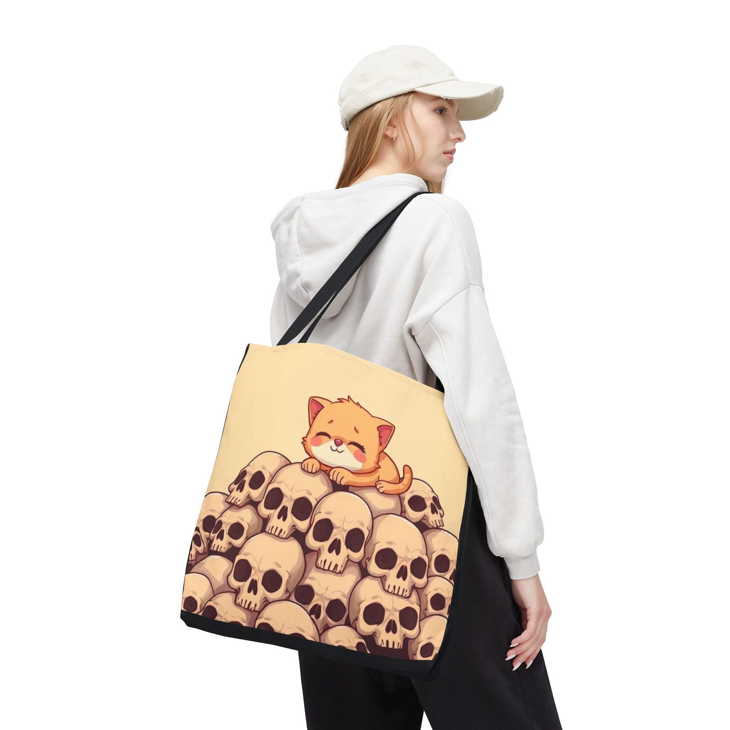 Cute Cat on a Pile of Skulls Tote Bag