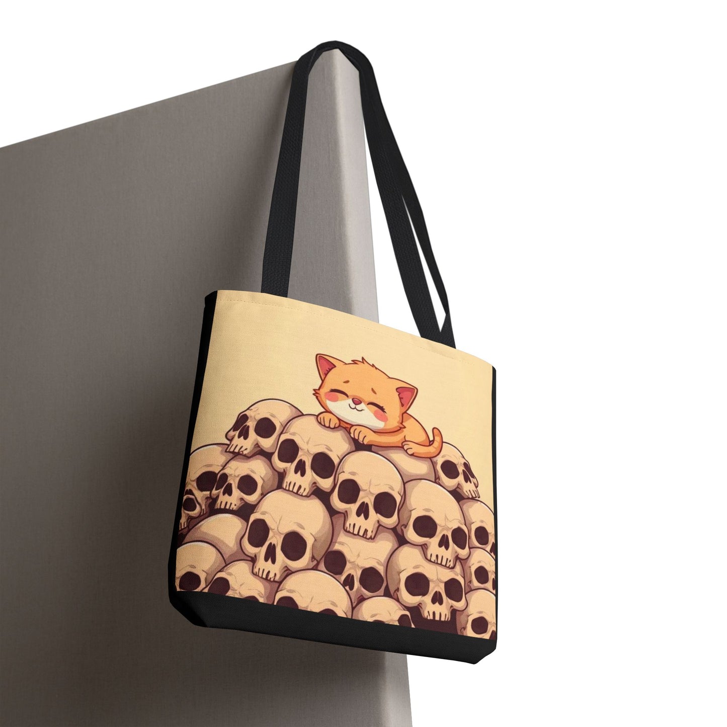 Cute Cat on a Pile of Skulls Tote Bag